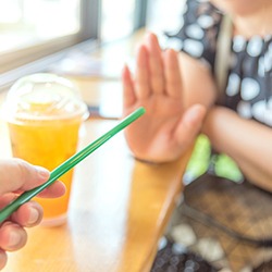 Woman rejecting straw