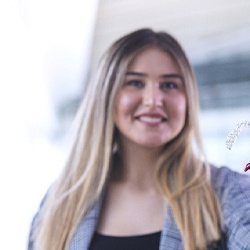 Woman smiling during Invisalign treatment