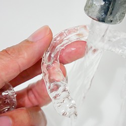 Cleaning and maintaining your ClearPro aligners is easier than cleaning teeth with traditional braces