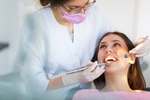 Person with dental emergency being treated by dentist in McKinney