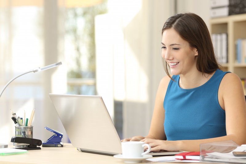 A woman learning how to find an Invisalign provider.