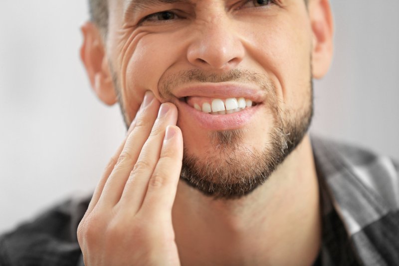 man with bright and sensitive teeth in McKinney