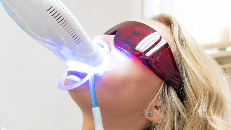person with stained teeth having them professionally whitened