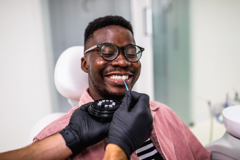 A man getting Lumineers from a dentist